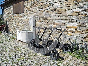 Golf trolleys at the wall photo